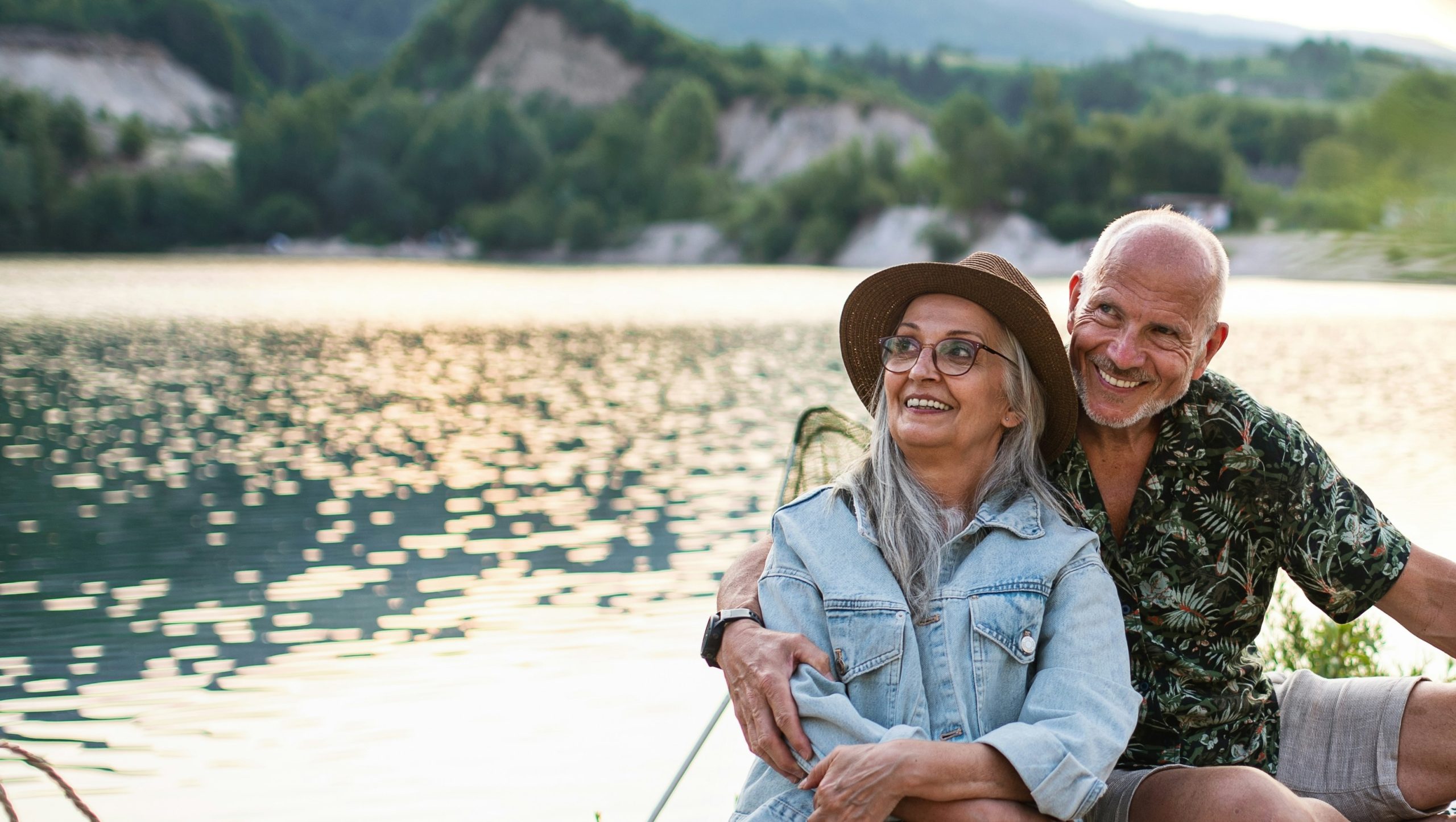 A couple enjoying retirement by the water